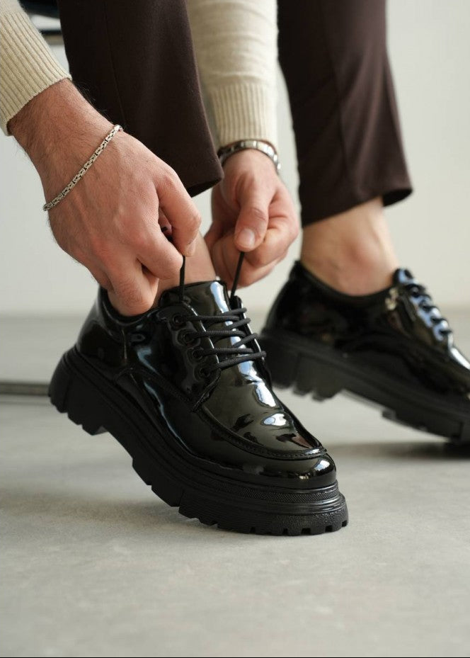 Vantage Axis patent black elevating shoe by Apollo Moda, third angle