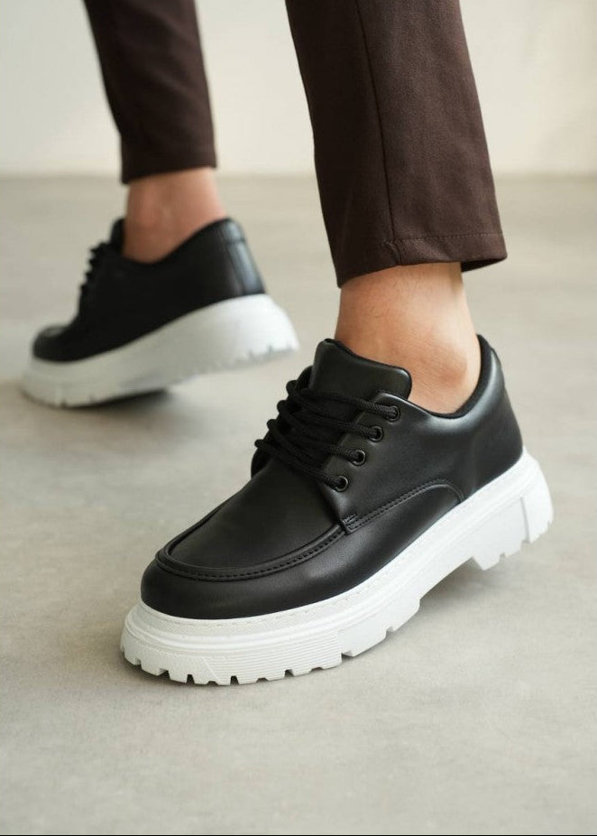 Vantage Apex black sneaker with white height-boosting sole by Apollo Moda, third angle