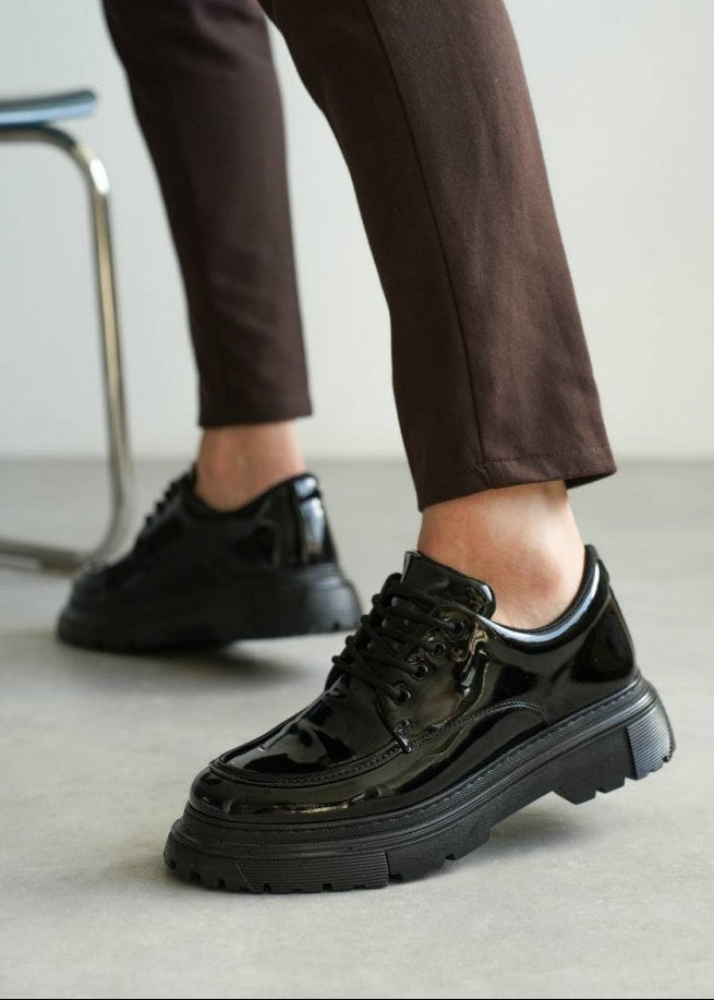 Men's Vantage Axis by Apollo Moda, black gloss shoe with height-boosting sole, second angle