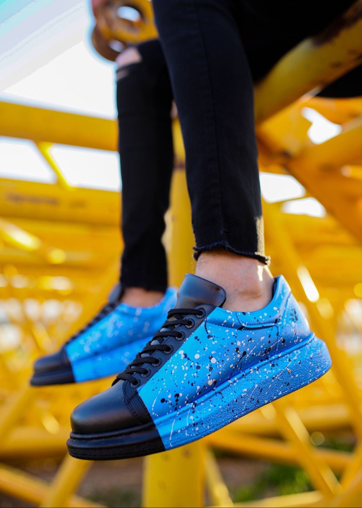 Men's Urban Pulse Vibe Shift by Apollo Moda, black sneaker with blue splatter paint, second angle